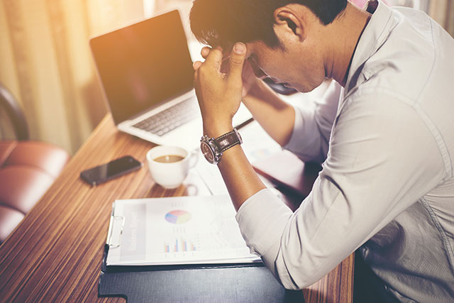 Figura 1.1 Estresse e ansiedade são comuns durante períodos de mudanças nas empresas.